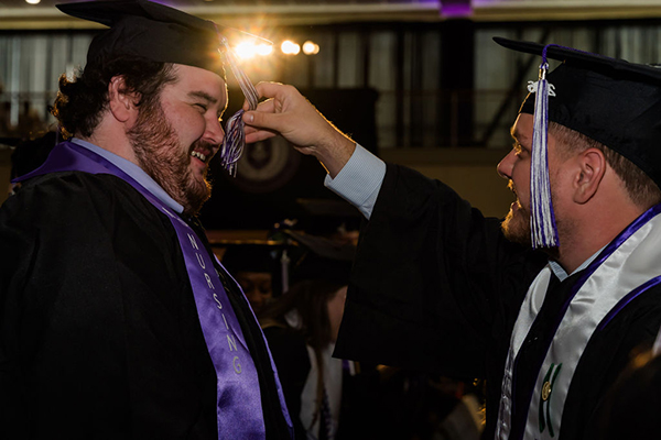 MGA Spring 2026 graduates turning tassles.