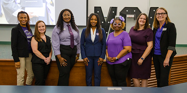 The Student Affairs Professional Development Team poses for a photo with keynote speaker, Mayor LaRhonda W. Patrick.